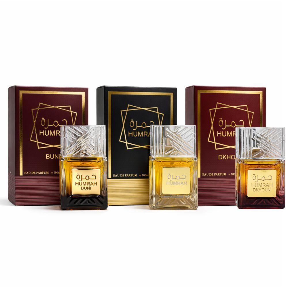 humrah eau de parfum 100 ml profumo orientale - foto 1 Tre flaconi Humrah Eau De Parfum 100ml in varianti marrone e nero con scatole, sfondo bianco