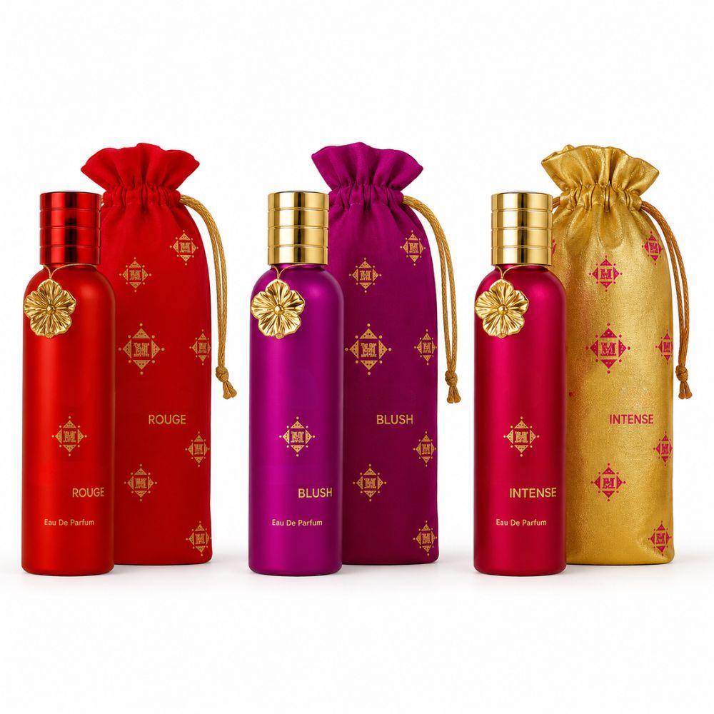 montage eau de parfum 100 ml fragranza elegante con sacchetto incluso - foto 1 Tre flaconi di profumo Montage in varianti rosso, viola e oro con sacchetti coordinati