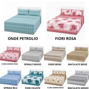Juego de cama de matrimonio con sábanas y fundas de almohada a juego
